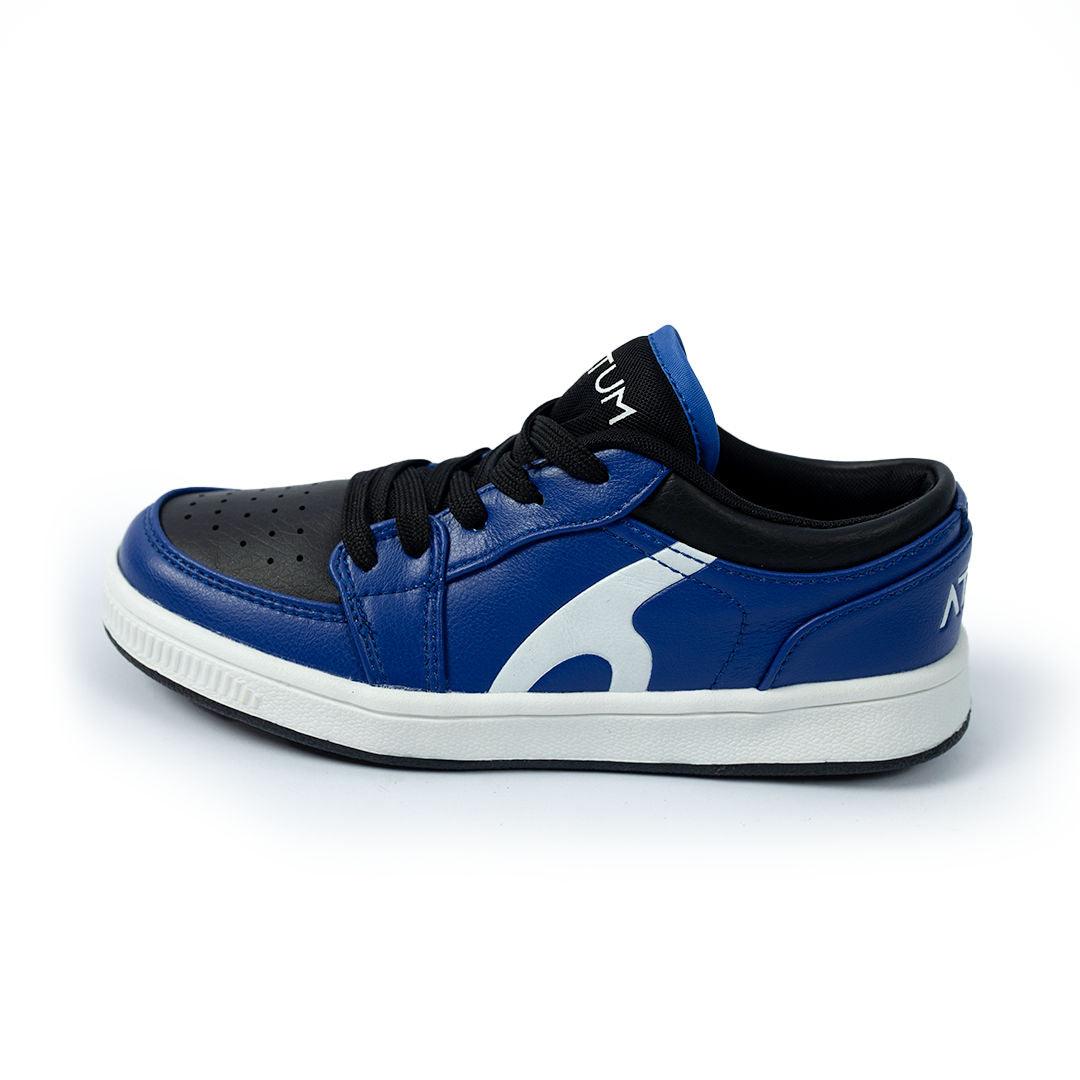 Photo by 𝗔𝗧𝗨𝗠 SPORTSWEAR ® on December 26, 2022. May be of blue/black lifestyle shoes with atum logo