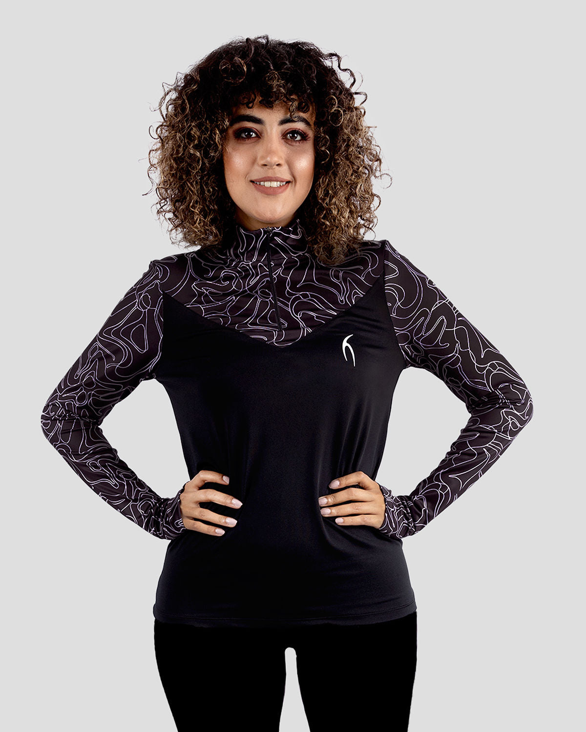 Photo by ð—”ð—§ð—¨ð— SPORTSWEAR Â® on December 20, 2022. May be an image of 1 woman wears black training t-shirt.