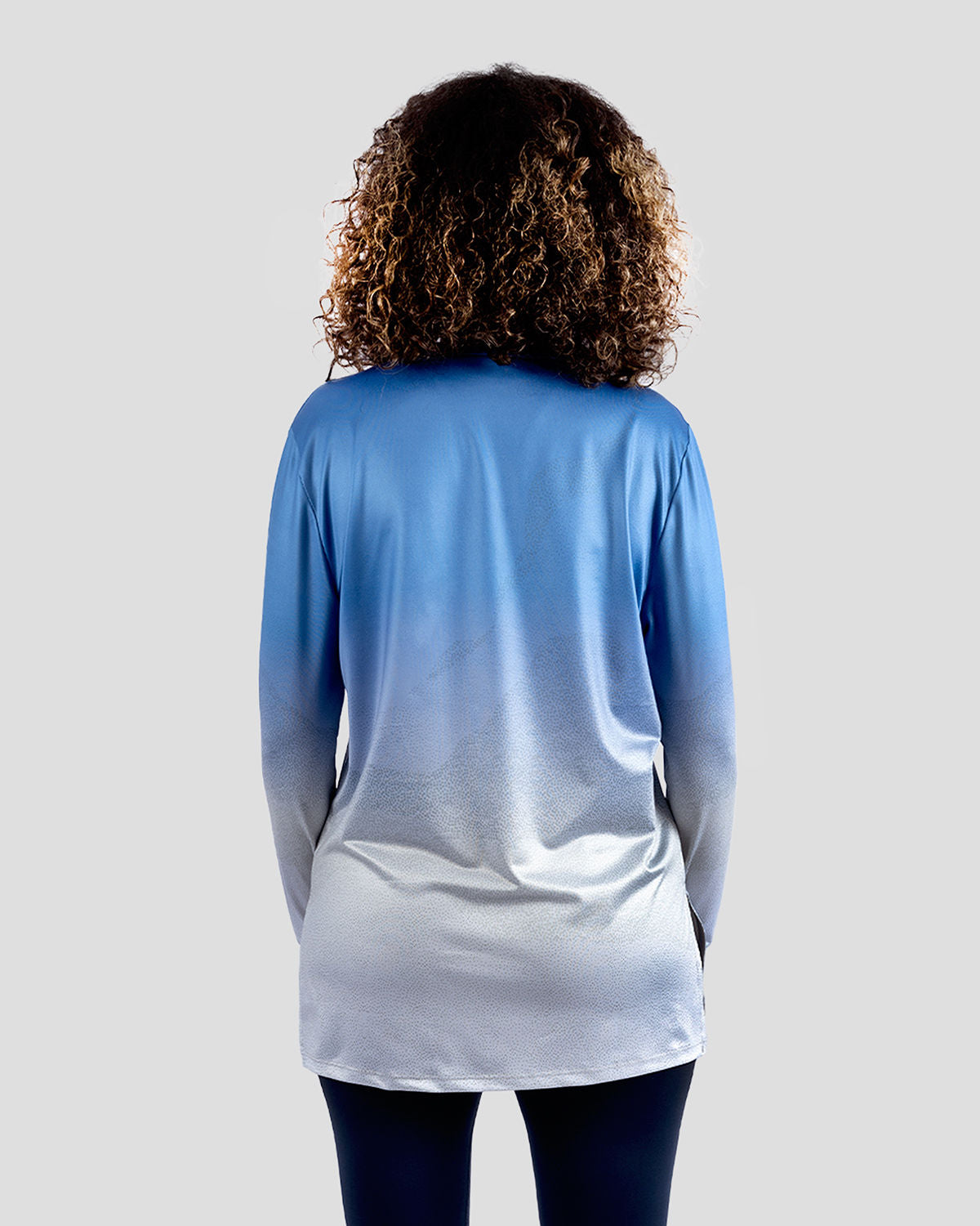 Photo by ð—”ð—§ð—¨ð— SPORTSWEAR Â® on December 20, 2022. May be an image of 1 woman wears blue gradient t-shirt.