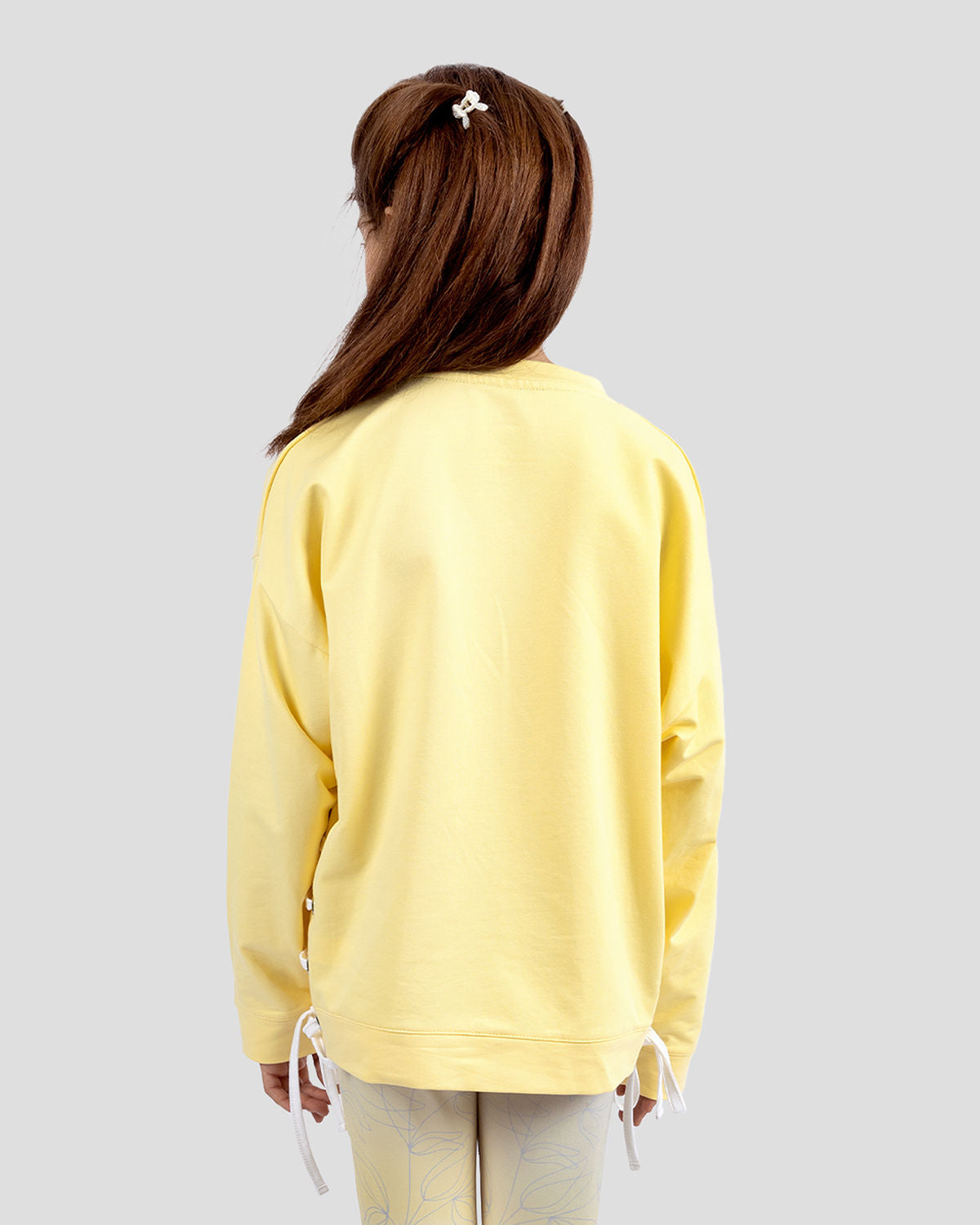 Photo by ð—”ð—§ð—¨ð— SPORTSWEAR Â® on December 20, 2022. May be an image of 1 girl wears yellow sweatshirt.