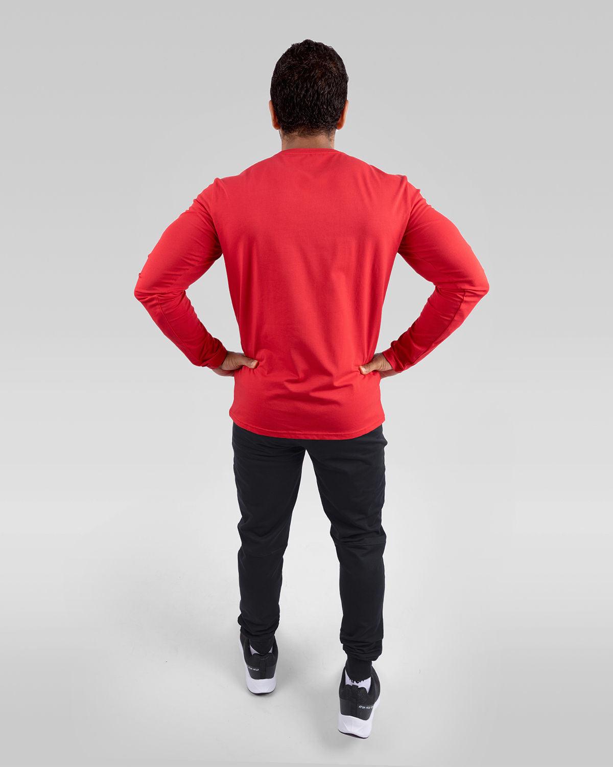 Photo by 𝗔𝗧𝗨ð�— SPORTSWEAR ® on December 20, 2022. May be an image of 1 men wear printed red t-shirt, black sweatpants and black shoes.