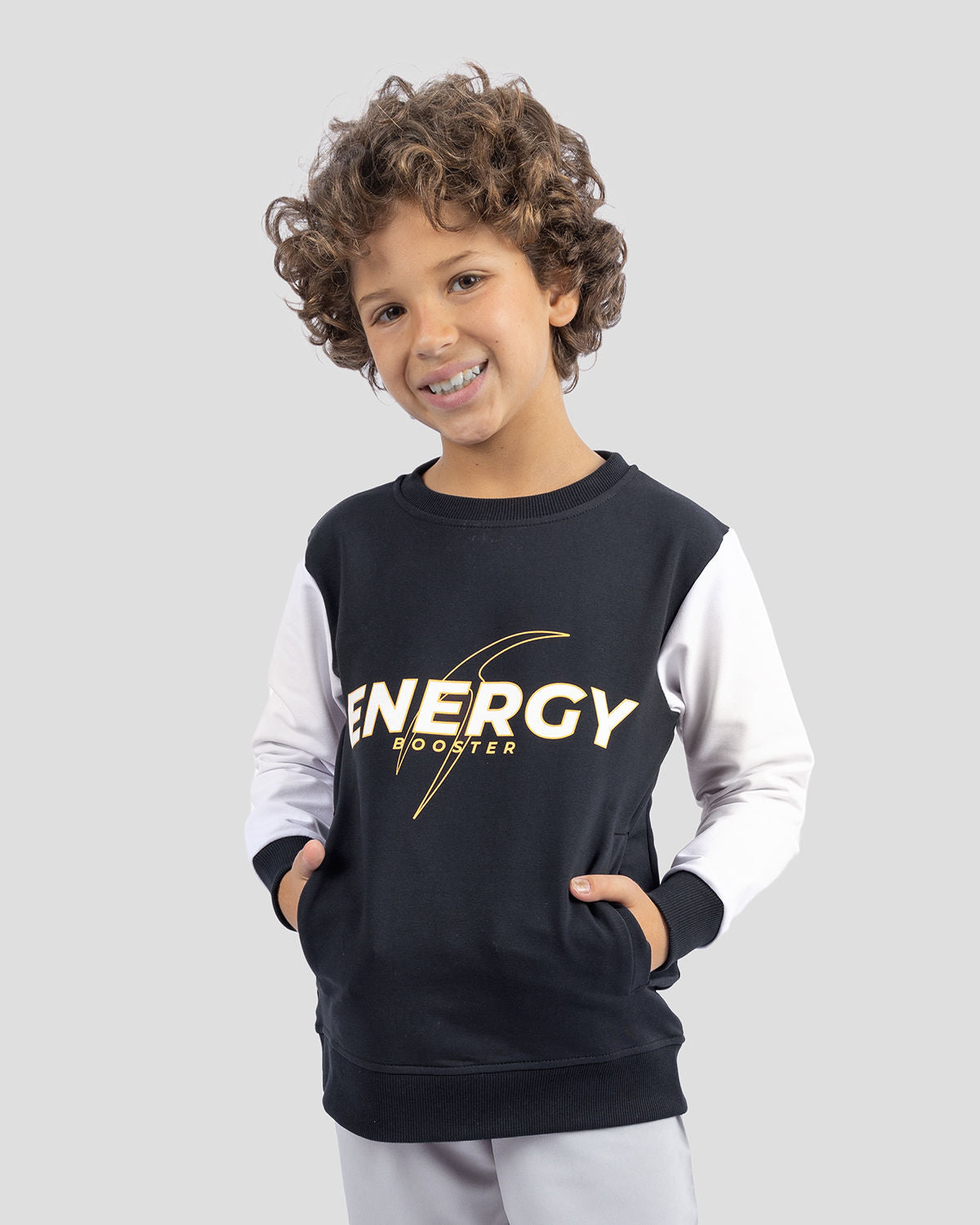 Photo by 𝗔𝗧𝗨ð�— SPORTSWEAR ® on December 20, 2022. May be an image of 1 boy wears a Black sweatshirt and a text said '' energy''.