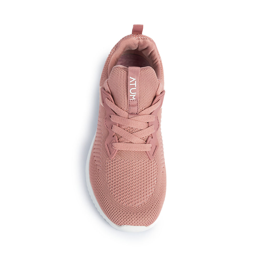 Photo by ð—”ð—§ð—¨ð— SPORTSWEAR Â® on December 26, 2022. May be a rose women's ultrafly training shoes with atum logo.