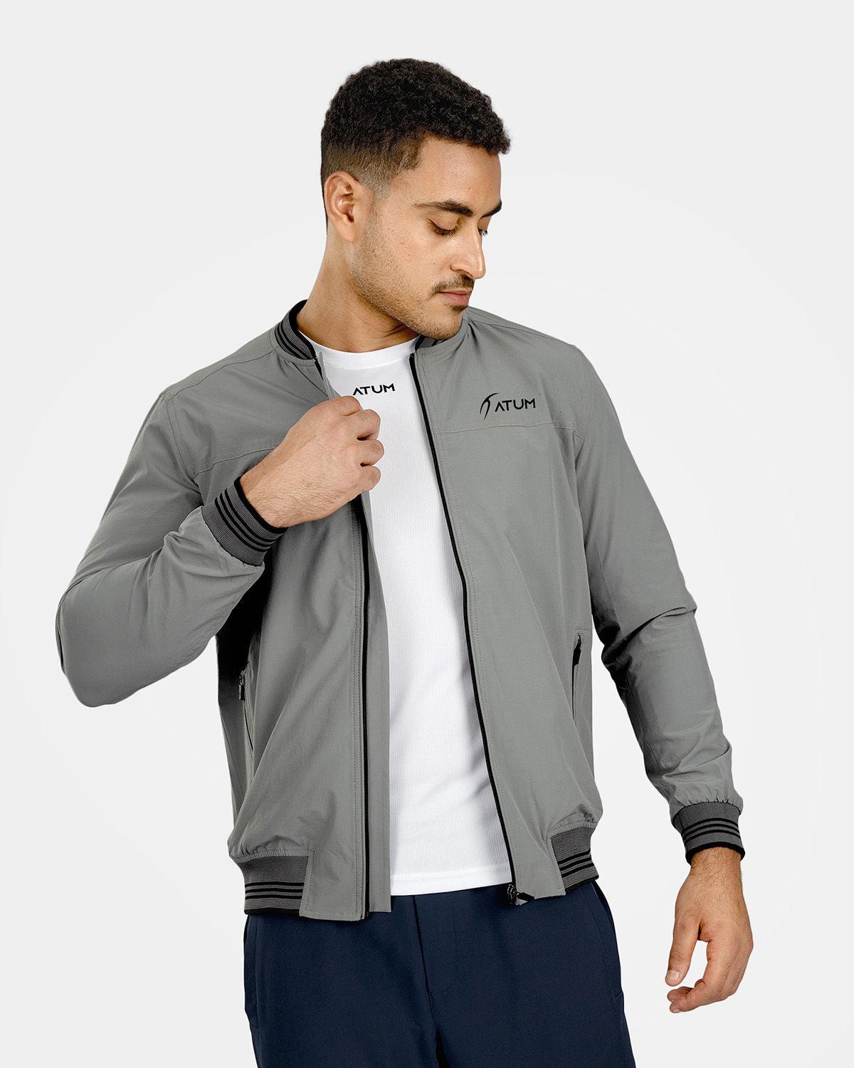 Photo by 𝗔𝗧𝗨ð�— SPORTSWEAR ® on December 20, 2022. May be an image of 1 man wear gray jacket with white basic t-shirt.