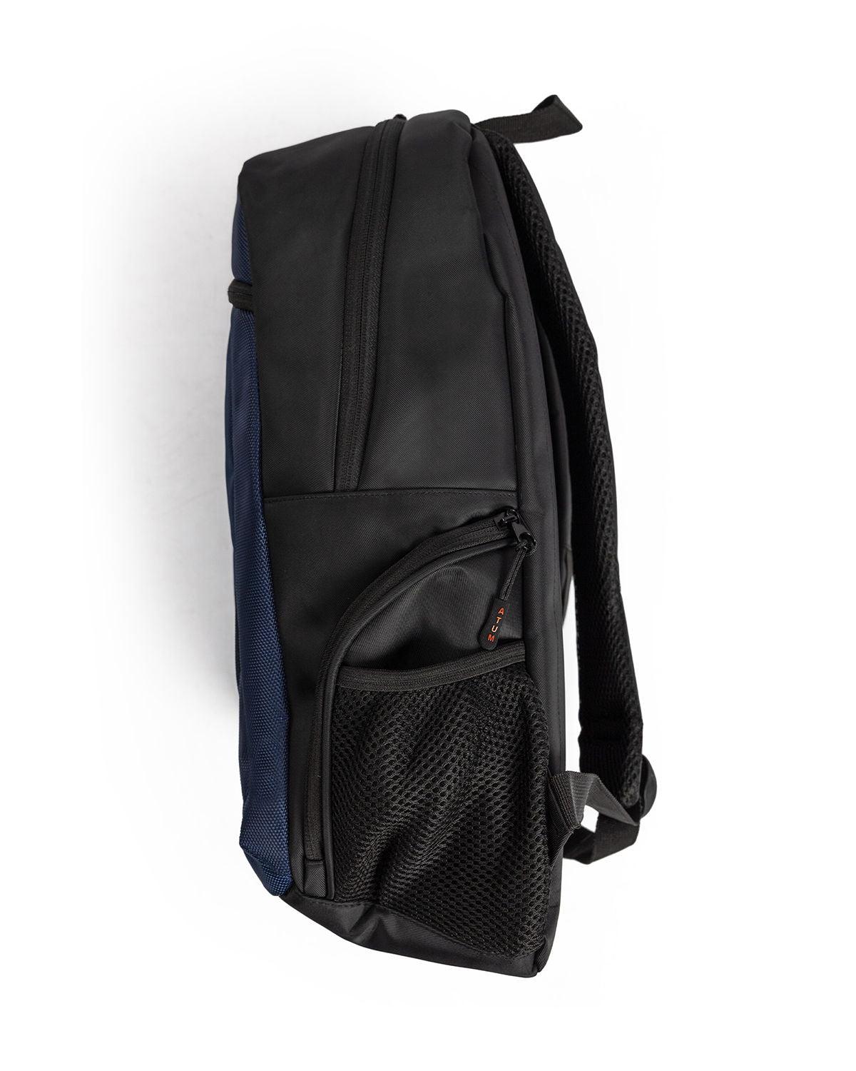 Photo by 𝗔𝗧𝗨𝗠 SPORTSWEAR ® on December 26, 2022. May be a navy premium backpack.