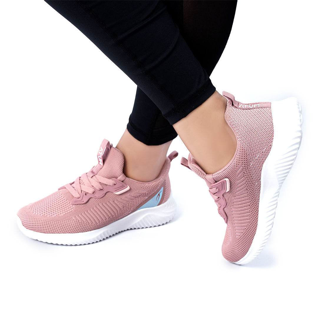 Photo by 𝗔𝗧𝗨𝗠 SPORTSWEAR ® on December 26, 2022. May be a rose women's ultrafly training shoes with atum logo.