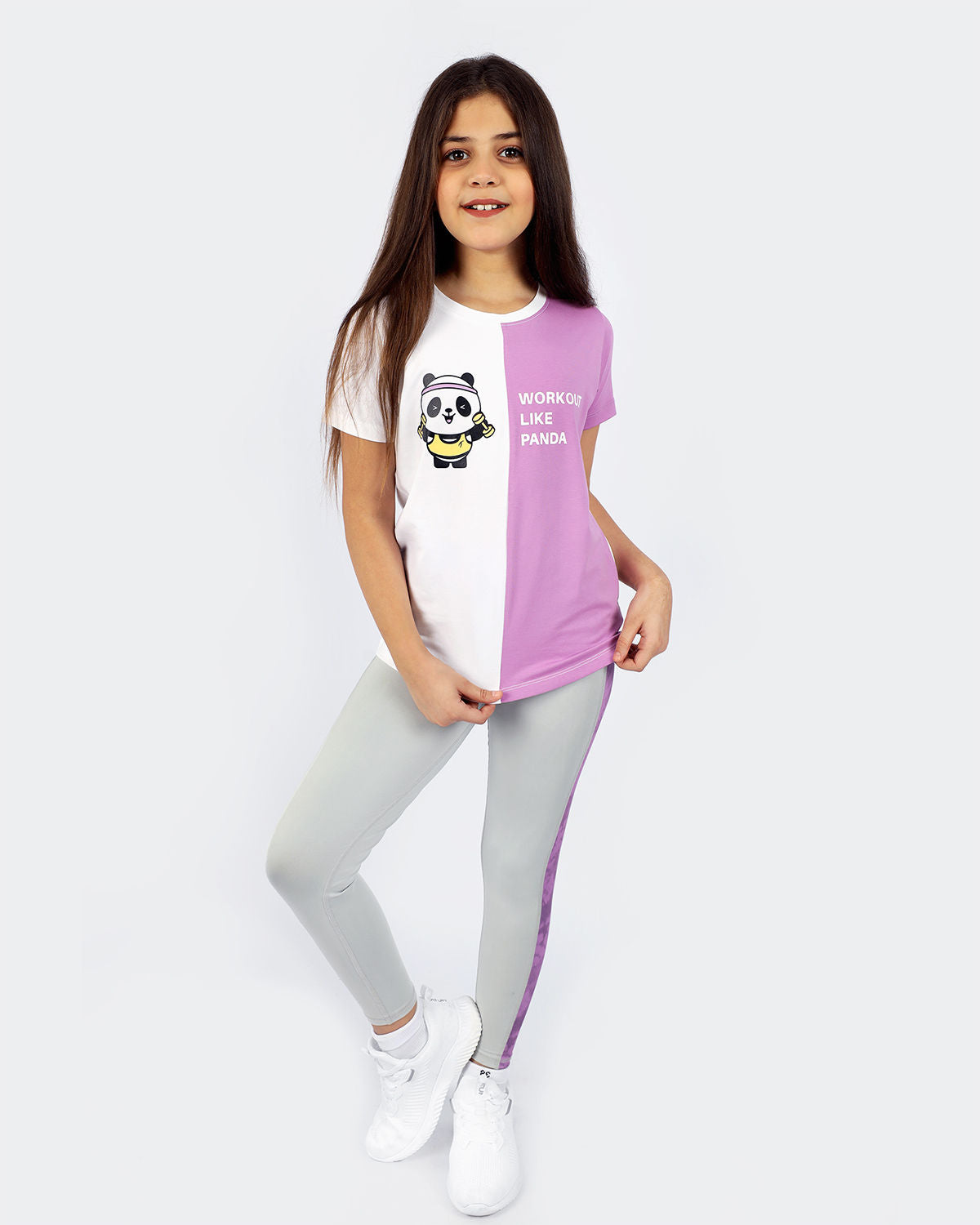 Photo by 𝗔𝗧𝗨𝗠 SPORTSWEAR ® on December 20, 2022. May be an image of 1 girl wears gray marble leggings, panda violet/white t-shirt and white shoes.