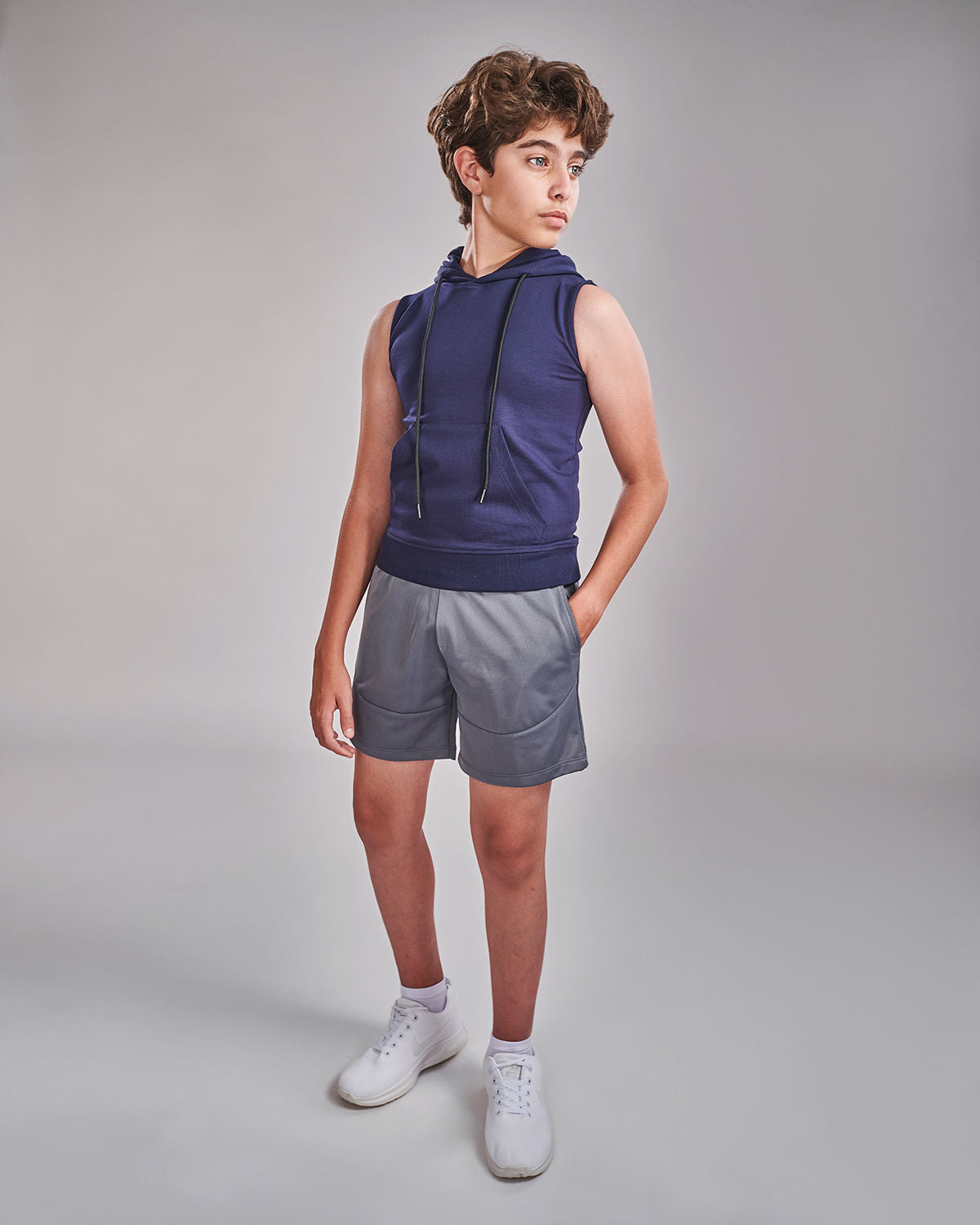 Photo by 𝗔𝗧𝗨𝗠 SPORTSWEAR ® on December 20, 2022. May be an image of 1 boy wears navy hooded top and a gray shorts with in game logo.