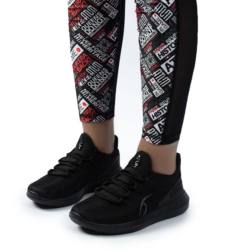 Photo by 𝗔𝗧𝗨ð�— SPORTSWEAR ® on December 26, 2022. May be a black unisex training shoes with atum emblem.