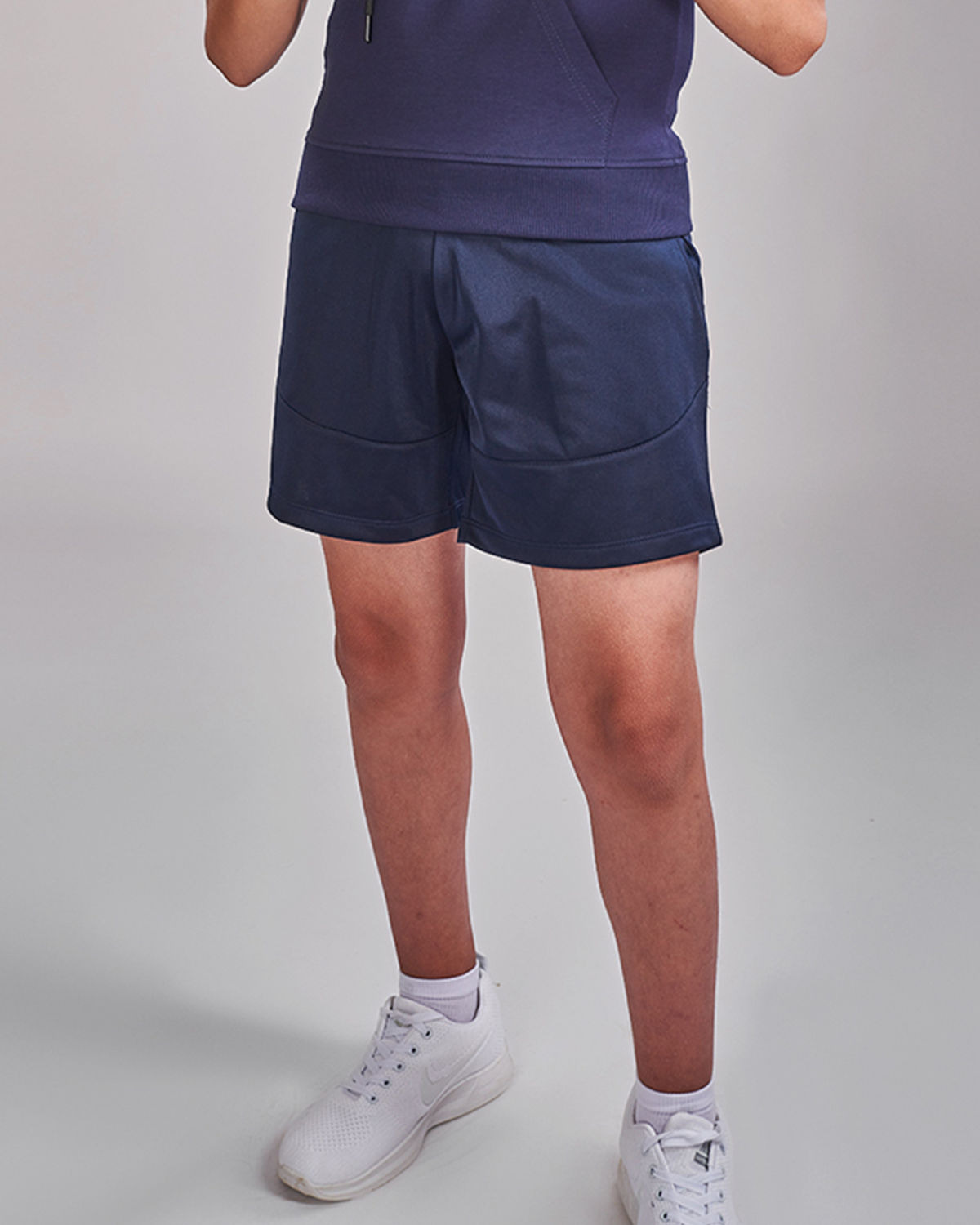 Photo by 𝗔𝗧𝗨𝗠 SPORTSWEAR ® on December 20, 2022. May be an image of 1 boy wears navy training shorts..