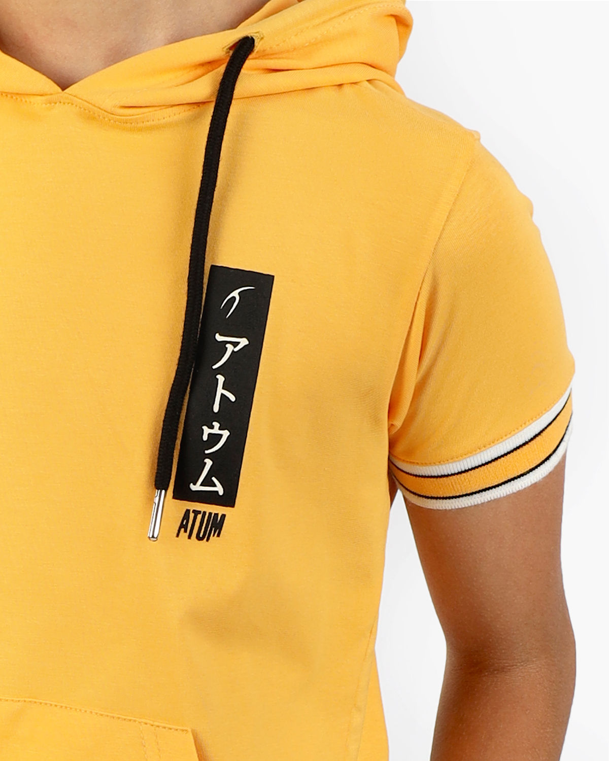 Photo by 𝗔𝗧𝗨𝗠 SPORTSWEAR ® on December 20, 2022. May be an image of 1 boy wears a yellow t-shirt and a text said '' Atum''.