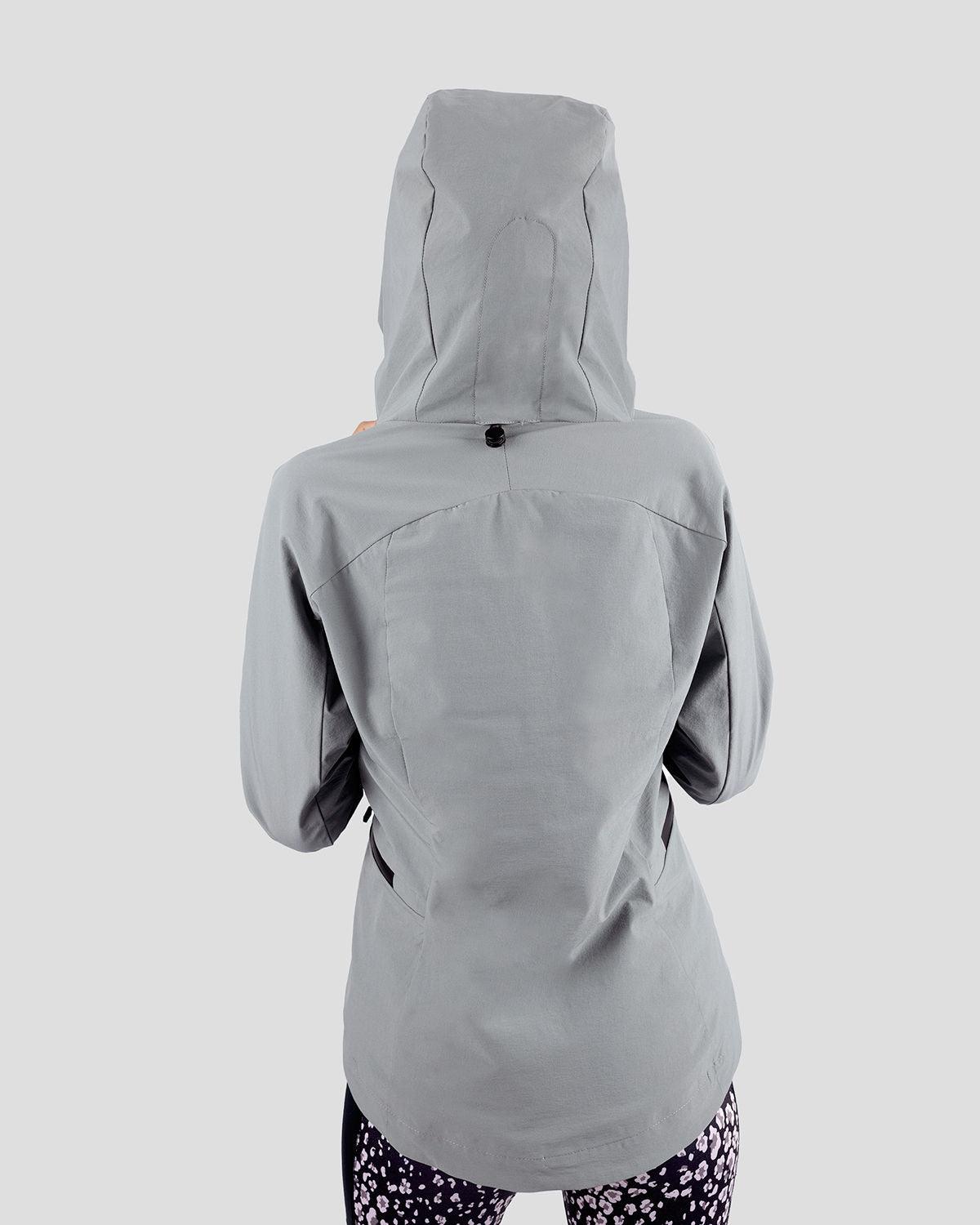 Photo by ð—”ð—§ð—¨ð— SPORTSWEAR Â® on December 20, 2022. May be an image of 1 woman wear gray jacket with printed atum emblem.