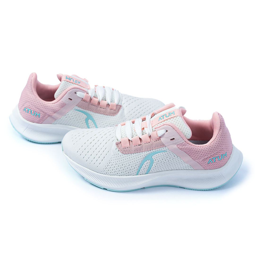 Photo by 𝗔𝗧𝗨ð�— SPORTSWEAR ® on December 26, 2022. May be a white/rose women's beyond sky training shoes with atum emblem.