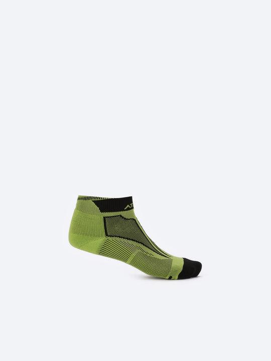 Photo by ð—”ð—§ð—¨ð— SPORTSWEAR Â® on December 26, 2022. May be of green/black low-cut kid's socks with atum logo