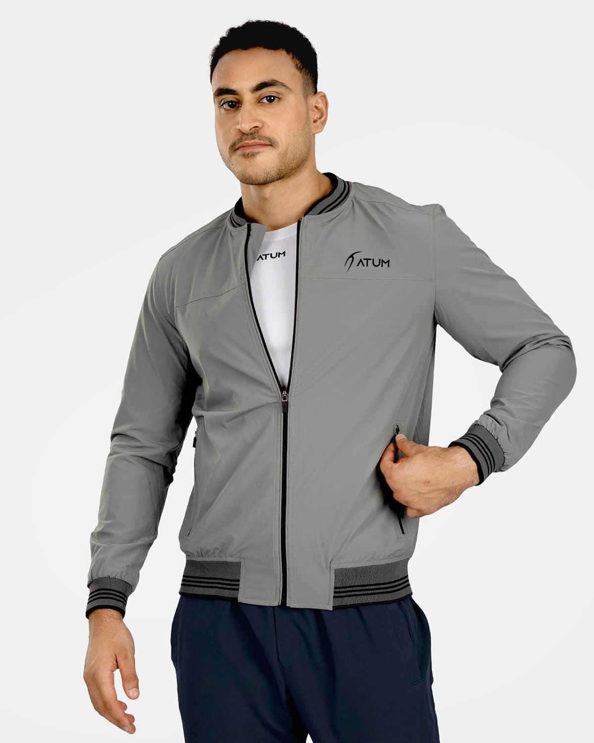Photo by 𝗔𝗧𝗨ð�— SPORTSWEAR ® on December 20, 2022. May be an image of 1 man wear gray jacket with white basic t-shirt.