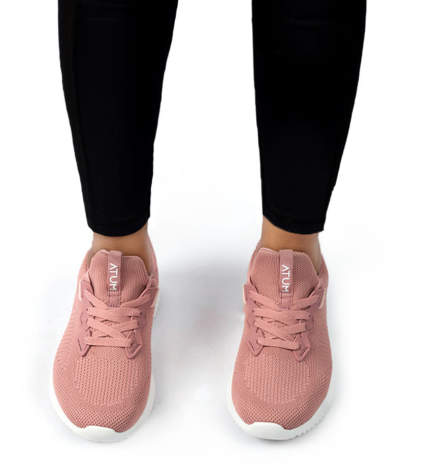 Photo by 𝗔𝗧𝗨ð�— SPORTSWEAR ® on December 26, 2022. May be a rose women's ultrafly training shoes with atum logo.